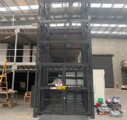 hydraulic cargo elevator with mesh enclosure